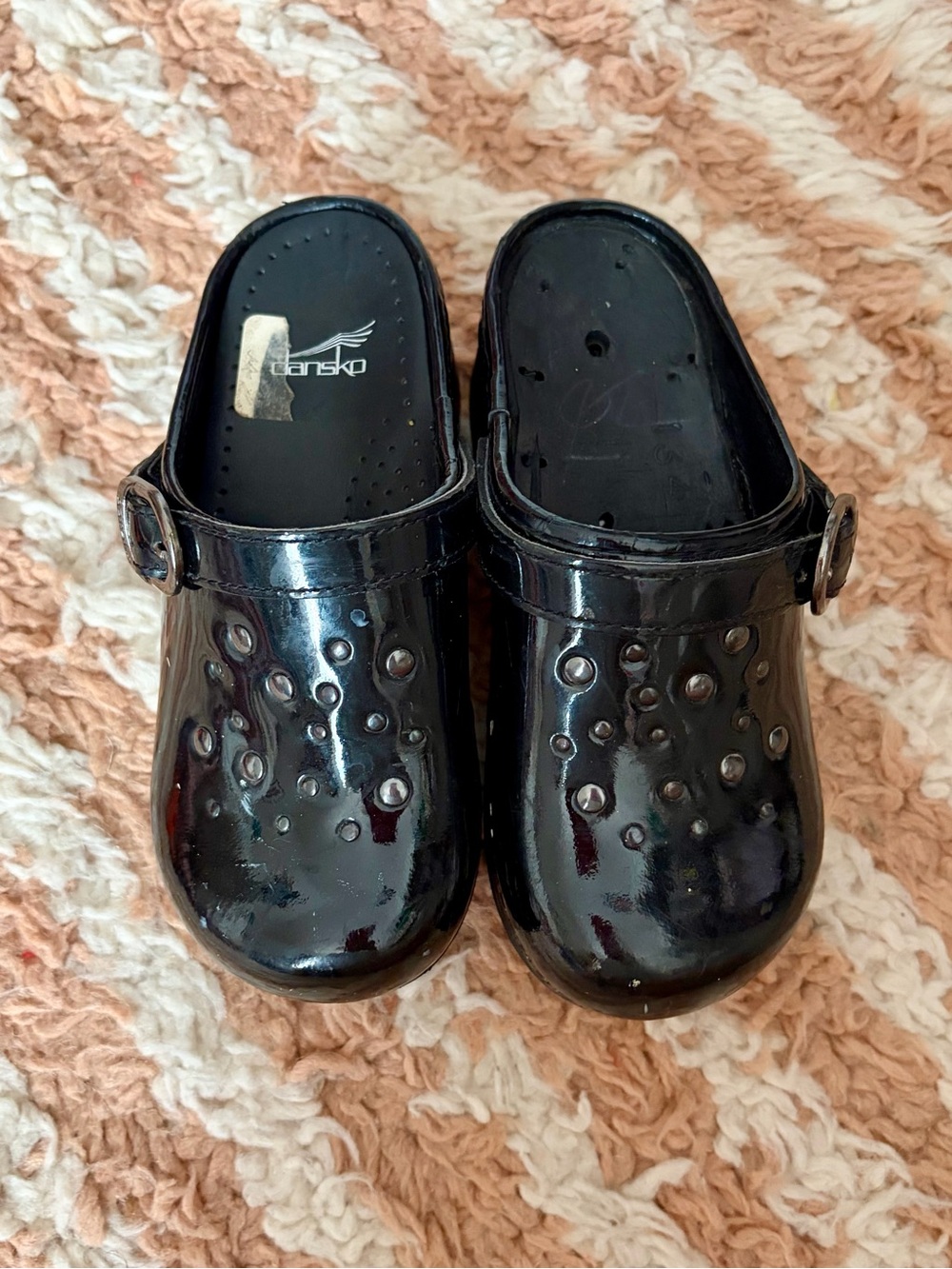 Dansko Black Patent Studded Clogs with Adjustable Strap
